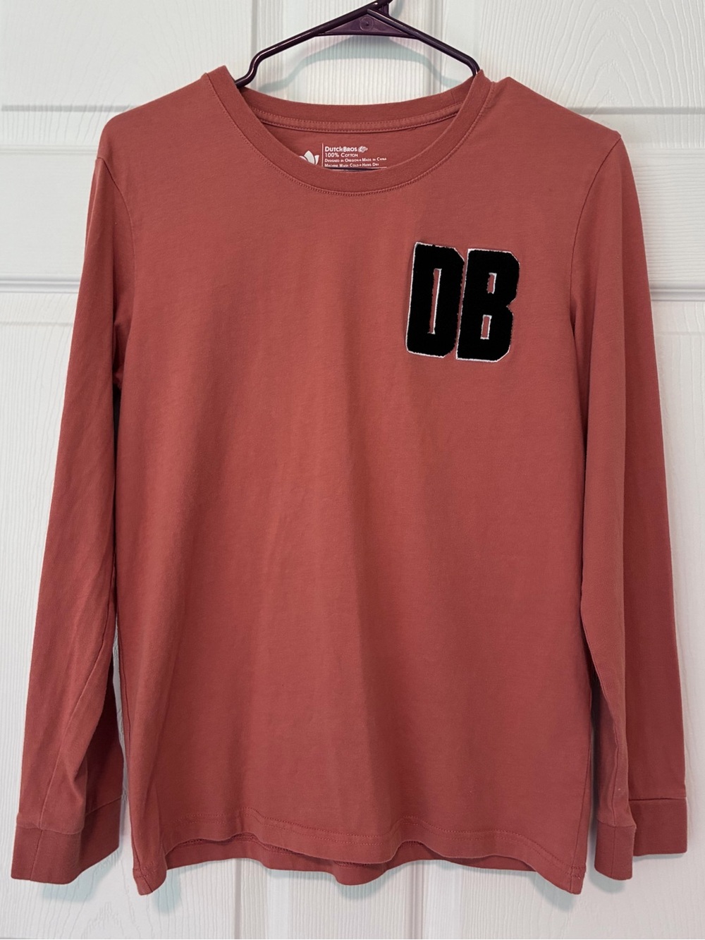 Dutch Bros Long-Sleeve Tee in Rose Clay with Black 'DB' Patch